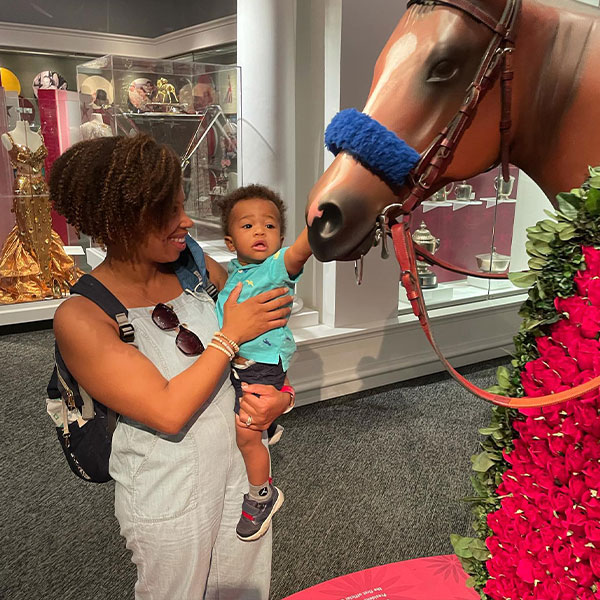 Mother and child in the Winners Circle exhibit